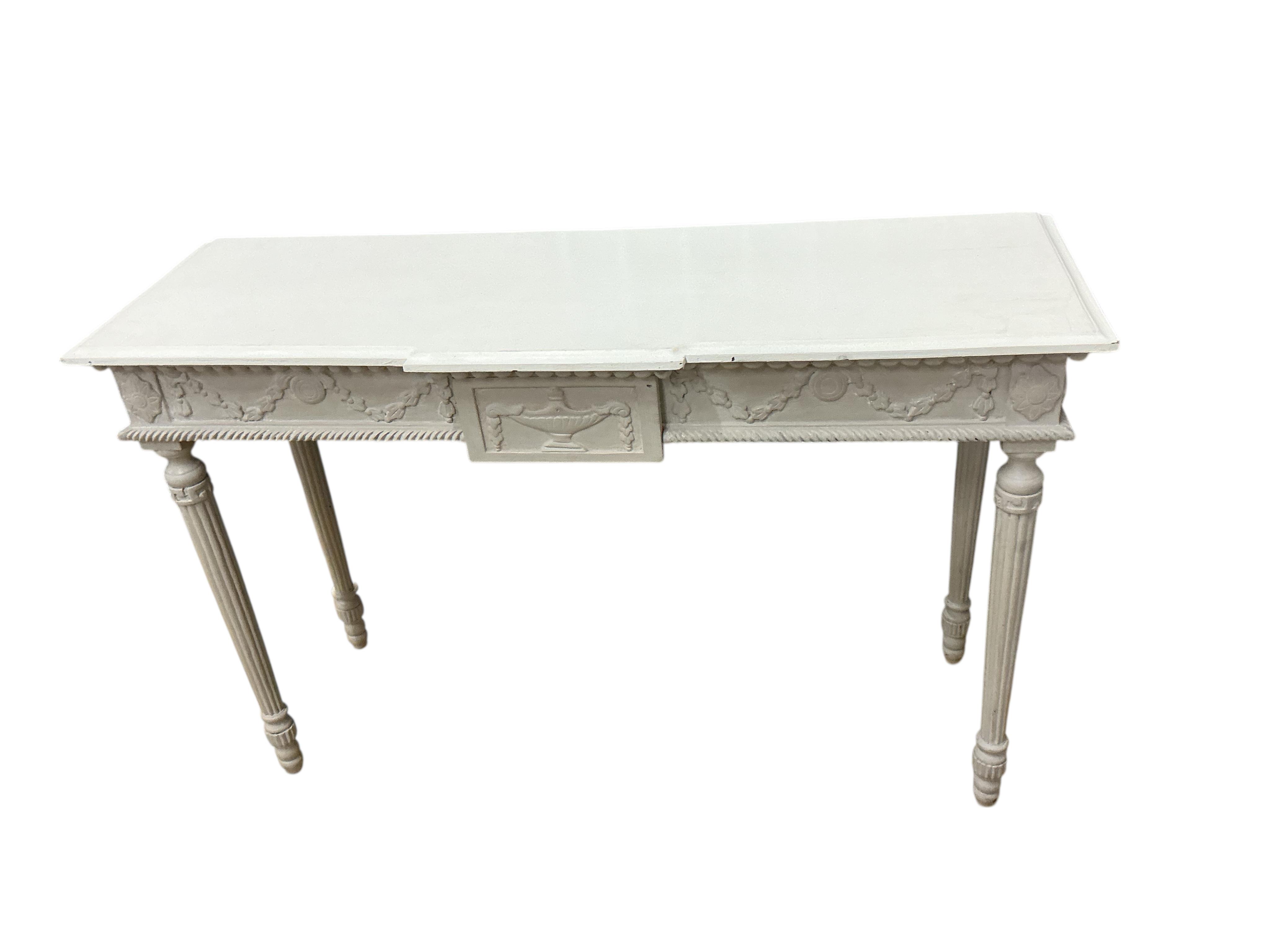 An Adam style painted breakfront console table, width 124cm, depth 41cm, height 81cm